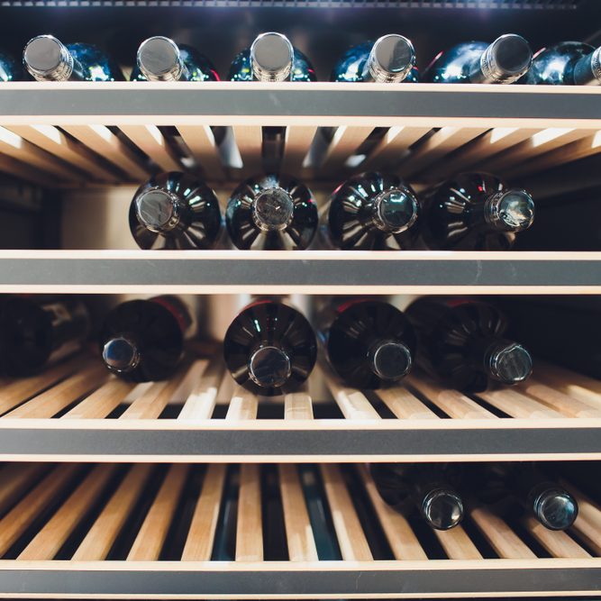 Storing,Bottles,Of,Wine,In,Fridge.,Alcoholic,Card,In,Restaurant.